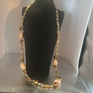Joan Rivers gorgeous animal print necklace. The beads are wooden.​